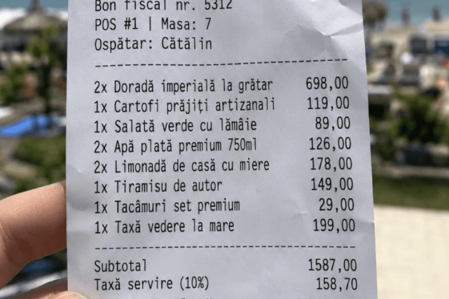 „Taxa pe vedere la mare: 199 lei”. Explicația este vizibilă în fotografie, la o examinare mai atentă a bonului fiscal