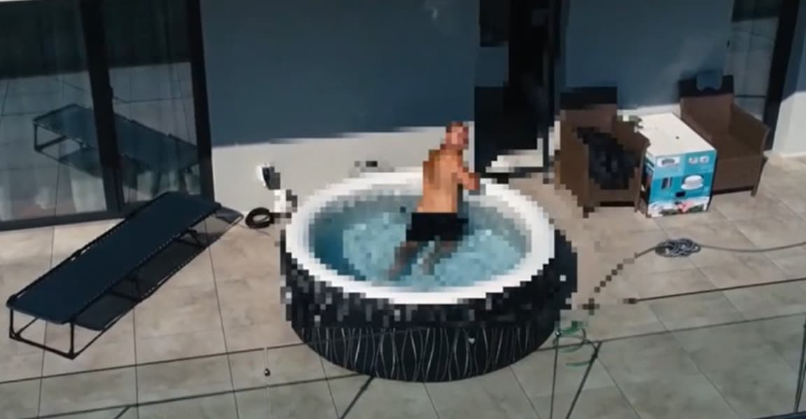 Momentul capturării unui traficant din Bistrița, reperat de dronă în timp ce se relaxa în piscină