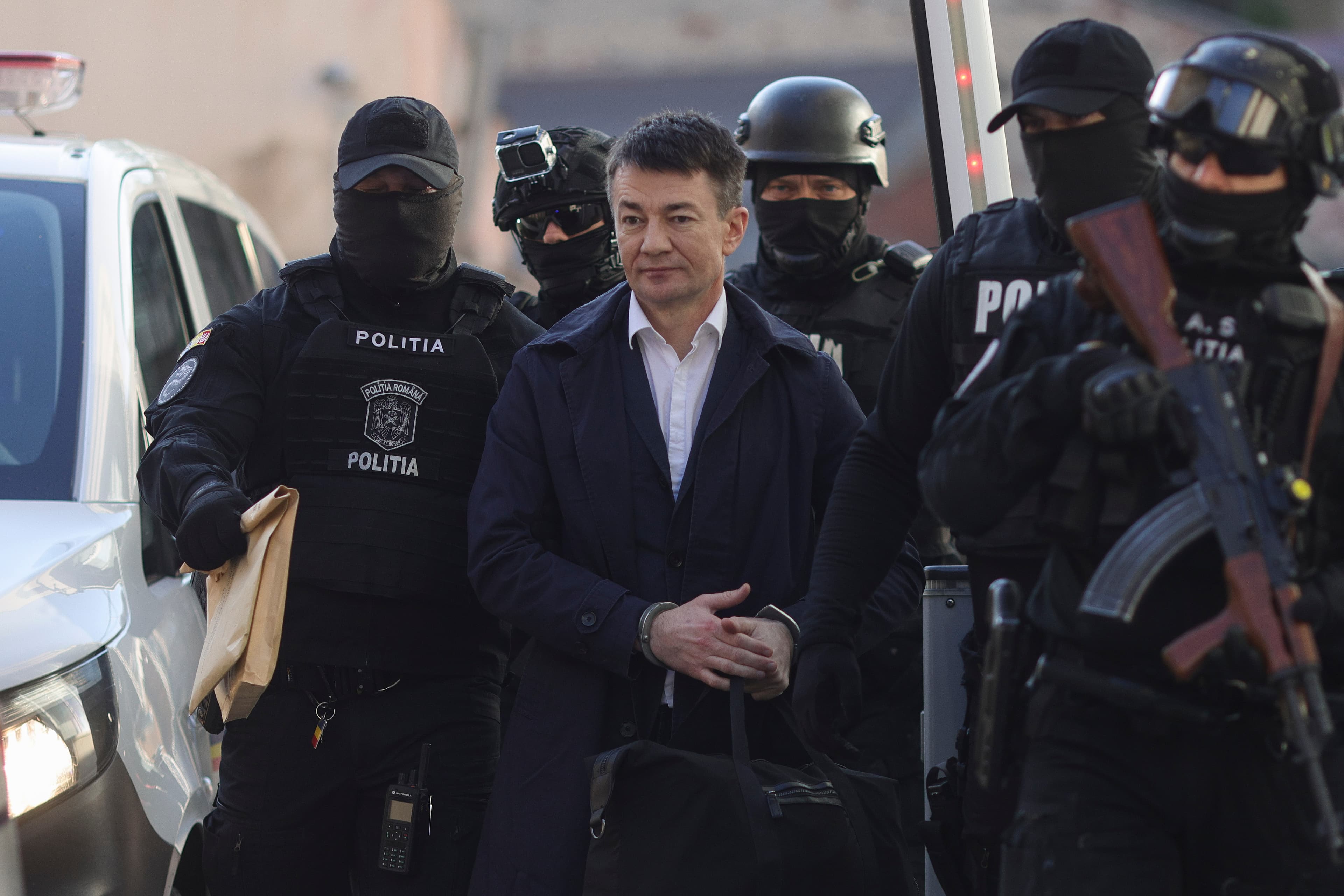 Romania hands over former intelligence services head suspected of spying back to Moldova