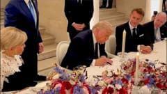 Moment Trump signs US-Iran agreement at Palace of Versailles